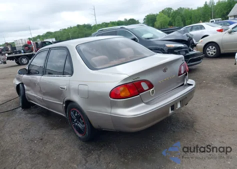 1999 Toyota Corolla Le из США, поврежденный, VIN 2T1BR12E9XC204275